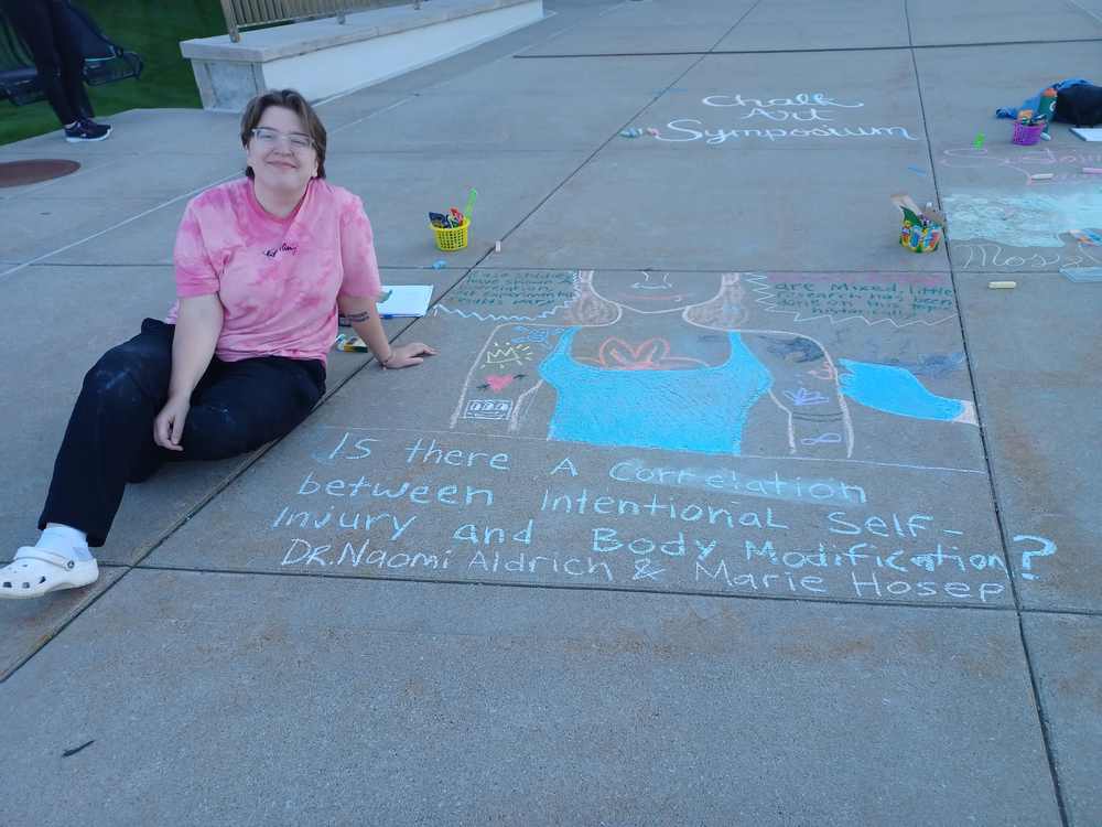 Psychology major Marie Hosep presents at GVSU Chalk Art Symposium